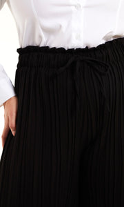 CURVE WIDE LEG PLEATED TROUSERS