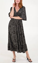 Load image into Gallery viewer, BLACK AND WHITE GEOMETRIC V-NECK PRINT SHIRRED WAIST MIDI DRESS